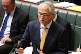 Malcolm Turnbull looks at Opposition while speaking in Parliament