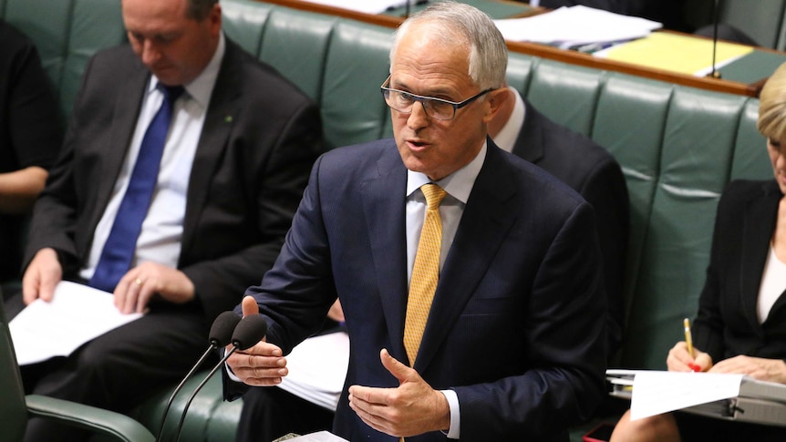 Malcolm Turnbull looks at Opposition while speaking in Parliament