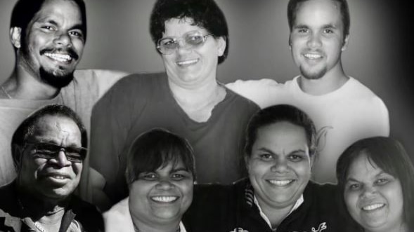A black and white composite image of an Indigenous family.
