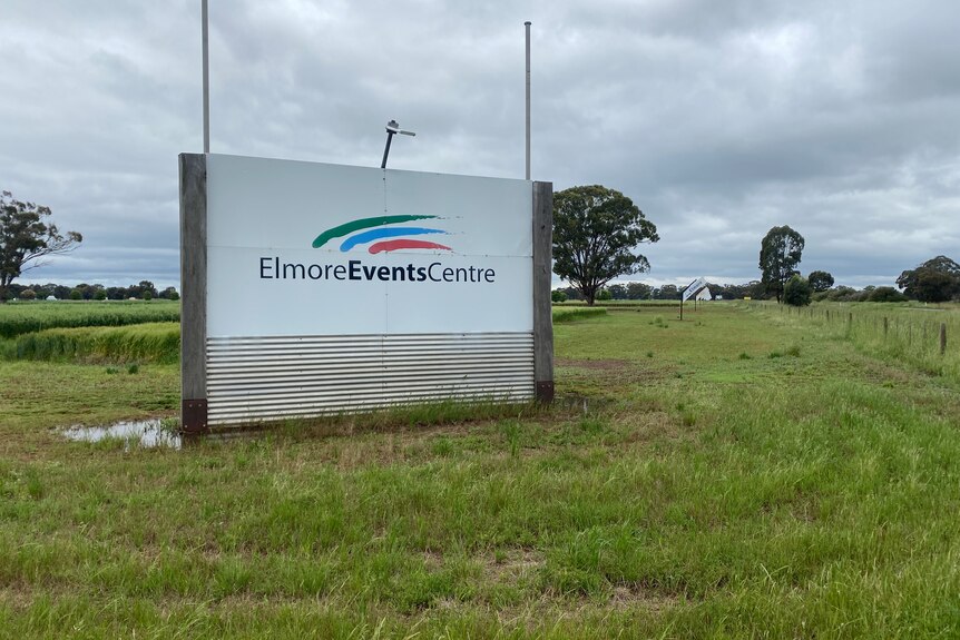 A sign reading 'Elmore Events Centre' in a grassy field.