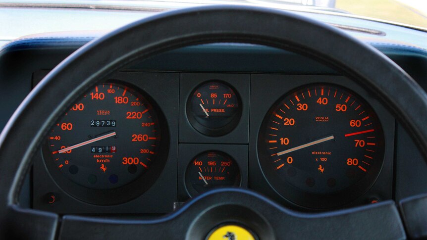 The instrument readouts on car dashboard.