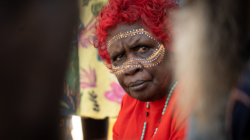 Margaret Perdjert look at the camera with face paint on.