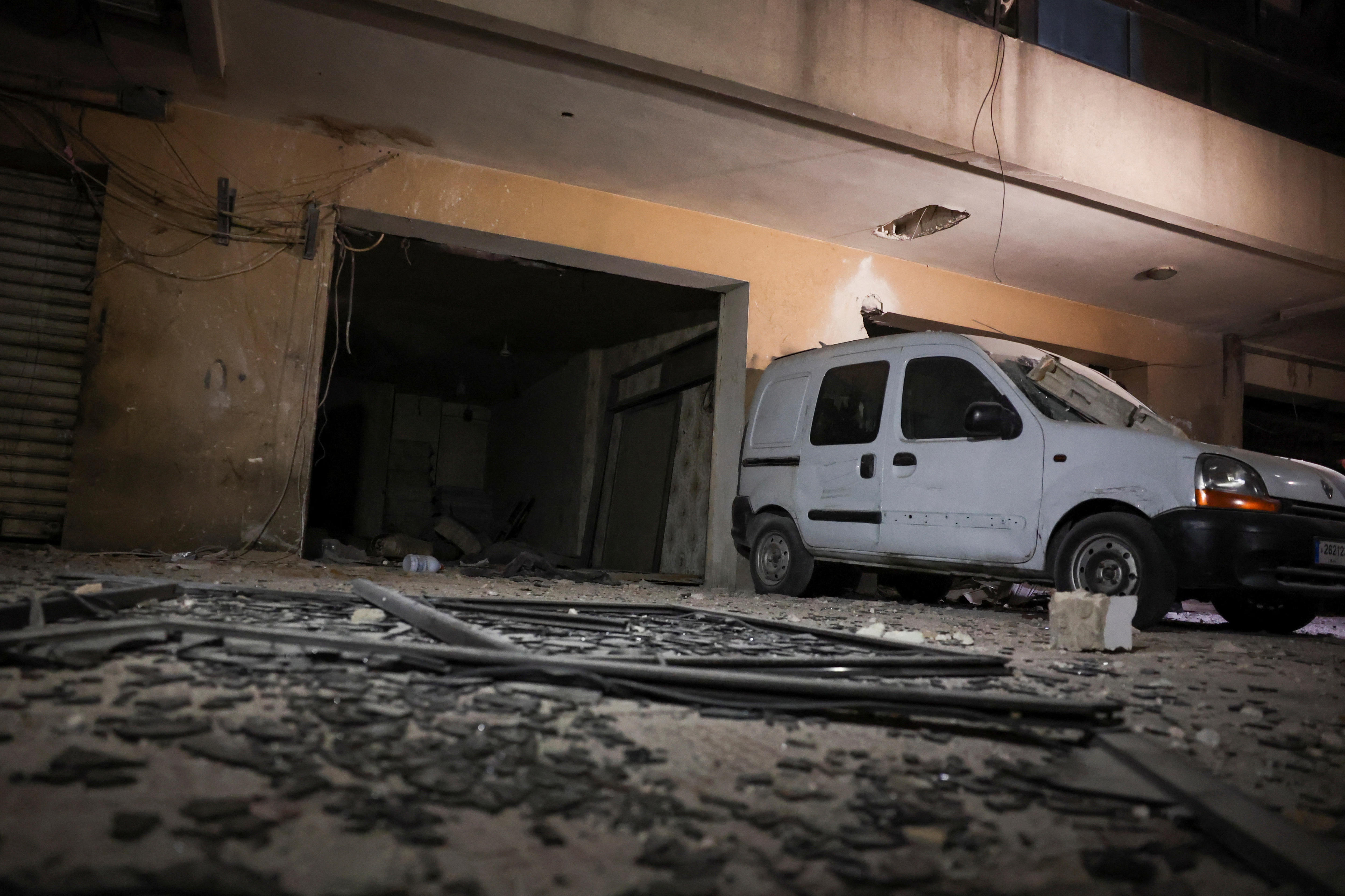 A damaged vehicle and debris