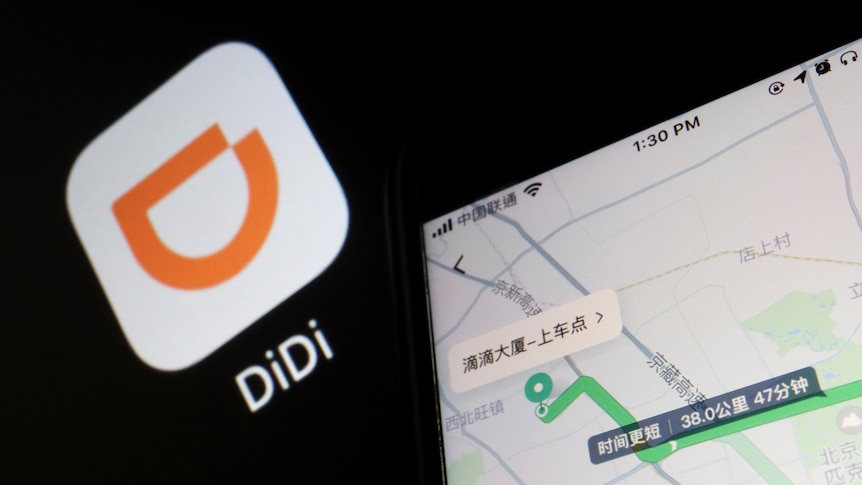 A company's logo of a stylised upside down "D" sits next to a street map showing informaiton in Chinese characters.