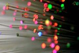 Light streams through fibre optic cables for local online