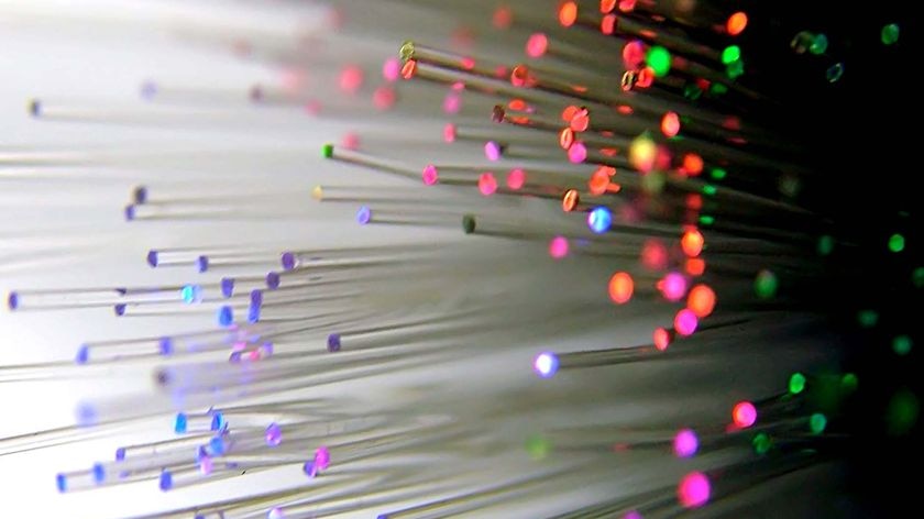 Light streams through fibre optic cables