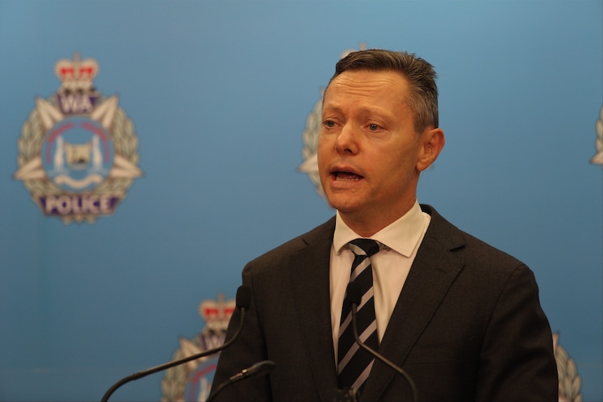 A head and shoulders shot of WA Police Sex Crime Division Inspector Hamish McKenzie during a media conference.