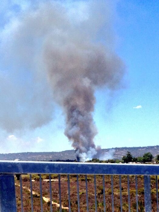 A fire is burning in the eastern Perth suburb of Wattle Grove.