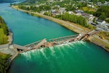 Drone footage shows the collapsed wooden bridge spanning the River Laagen in Norway