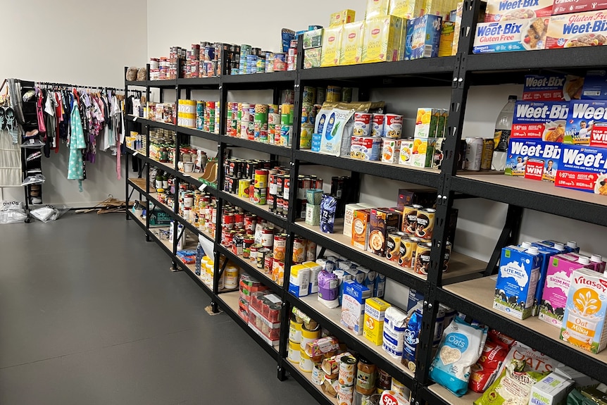 pantry of donated food items including cereal boxes