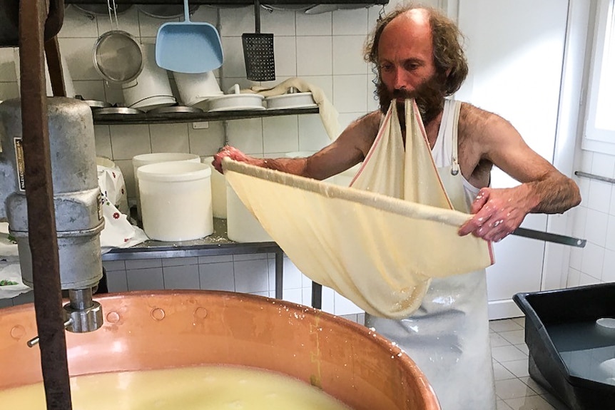 Christophe Prodanu works at a Swiss cheese room at 2000 metres altitude using traditional methods.