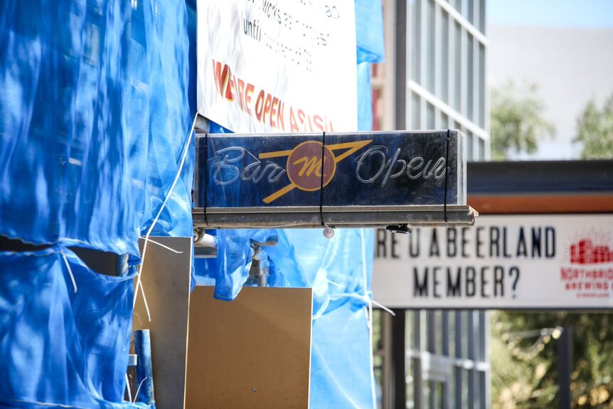 A sign outside Mustang Bar in Northbridge which reads 'bar open'.