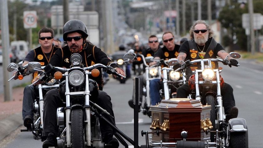 Bandido bikie gang members form a procession for the funeral of Ross 'Rosco' Brand