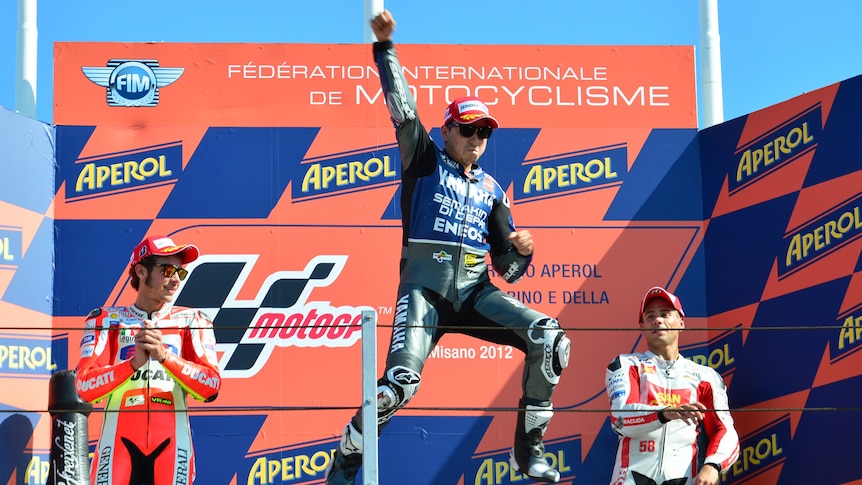 Lorenzo leaps on the podium