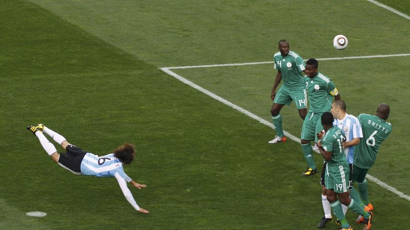 Flamboyant: Argentina's Gabriel Heinze (L) scored the only goal of the game.