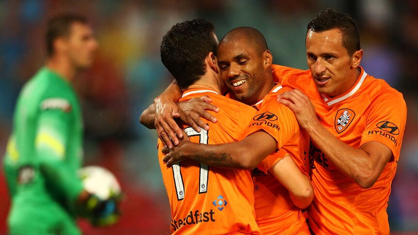 Brisbane Roar celebrate Henrique's goal