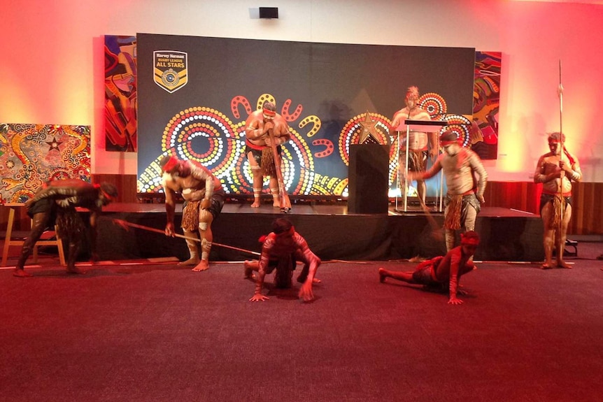 Aboriginal performers doing traditional music and dance display