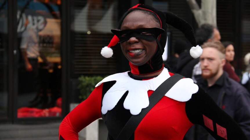 A fan dressed as Harley Quinn, from DC Comics.