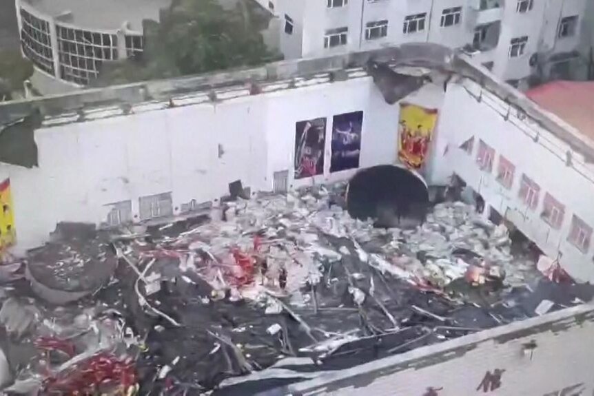 An aerial view of wreckage of a school gymnasium in China