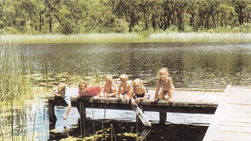 Swimmers on a jetty in one of the Thirlmere Lakes