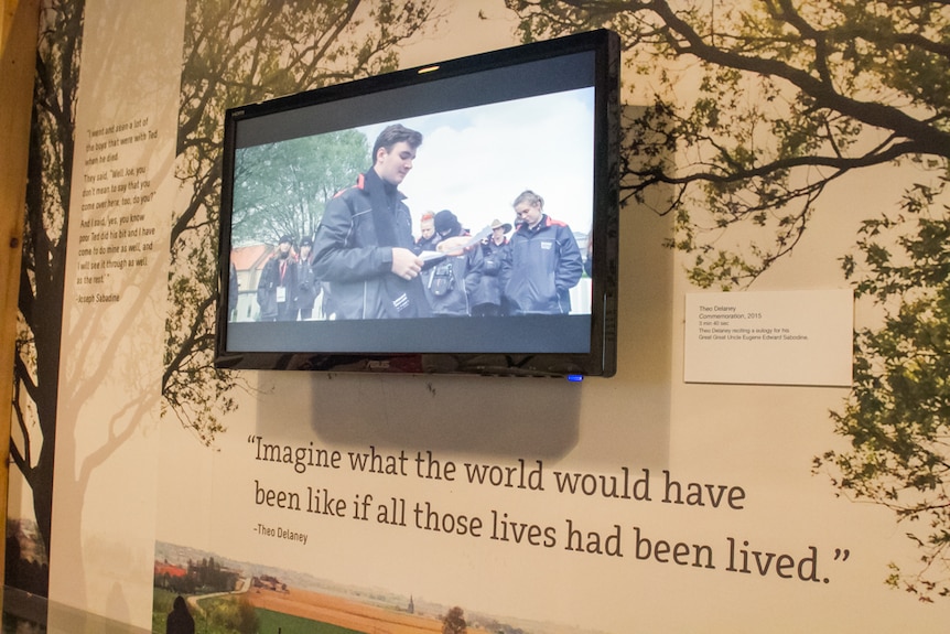 TV screen showing student delivering a eulogy for his Great Great Uncle.