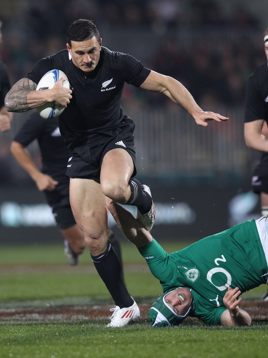 Out of my way ... Sonny Bill Williams tramples over Sean O'Brien