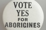 A badge reading Vote Yes for Aborigines.