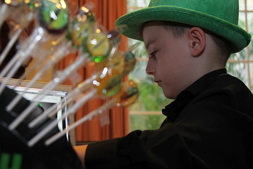 A photo of eight-year-old Angus Copelin-Walters at his computer.