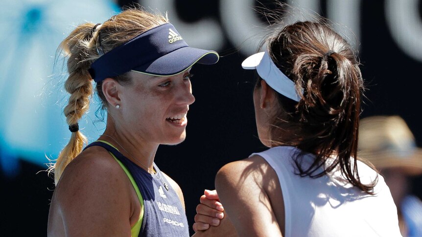 Angelique Kerber shakes hands with Su-Wei Hsieh at the Australian Open.