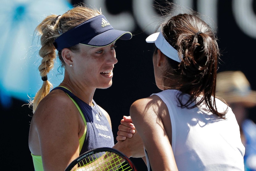 Angelique Kerber shakes hands with Su-Wei Hsieh at the Australian Open.