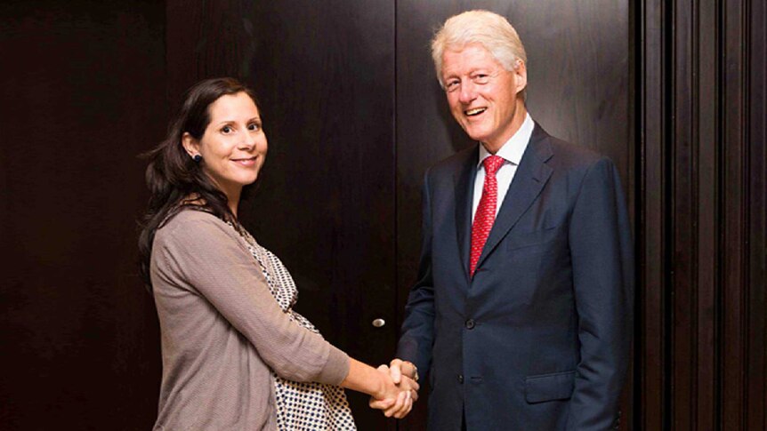 Elif Yavuz, Dutch national who was killed in the Kenyan mall siege, meets former President Bill Clinton.