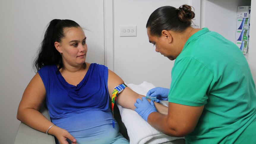 Indigenous Research coordinator Loretta Weatherall collects samples from pregnant mothers.