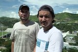 Samar and Zalman stand on a hill in Port Moresby