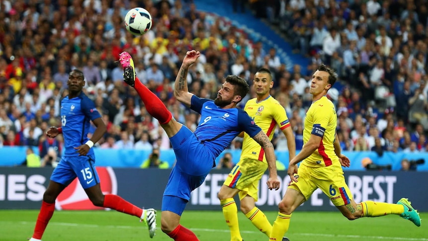 Olivier Giroud of France controls the ball