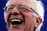Democratic presidential candidate Sen. Bernie Sanders grins
