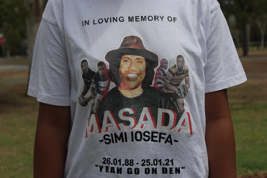 A loved one wears a shirt with 'in loving memory' and a photo of Masada Iosefa