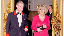 One day delay ... Prince Charles and Camilla Parker Bowles.