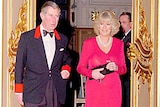 One day delay ... Prince Charles and Camilla Parker Bowles.