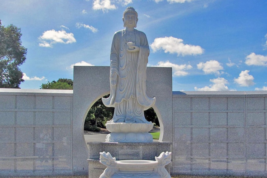 Buddha statue and wall