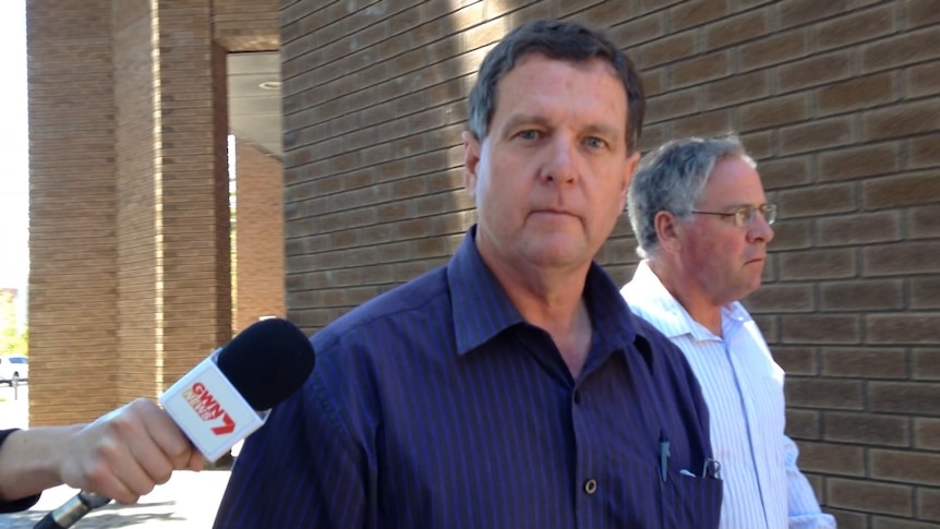 Picture of Stephen John Landless looking at the camera walking out of Bunbury Magistrates Court