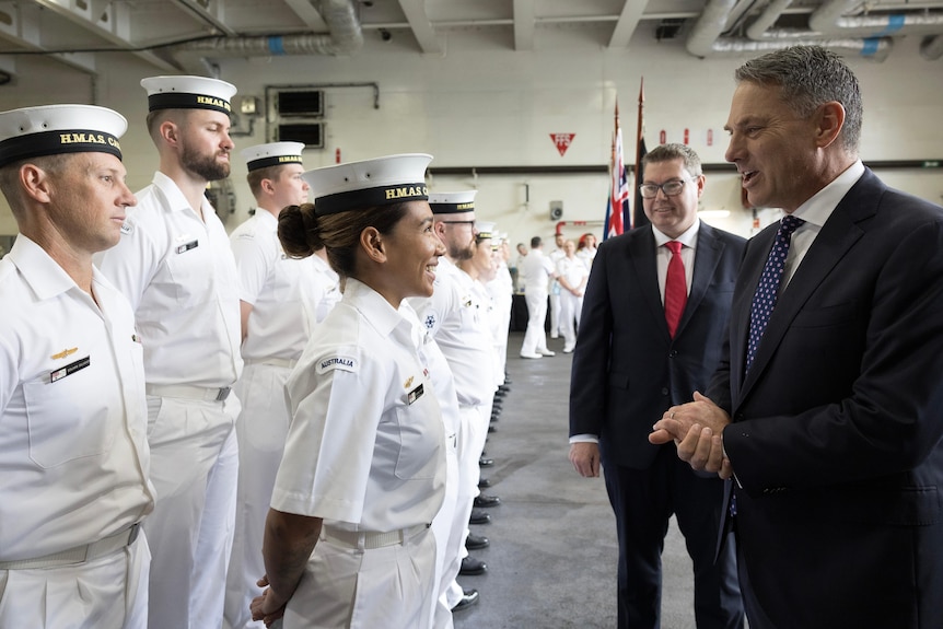 The Deputy Prime Minister, the Hon Richard Marles MP greets sailors onboard HMAS Canberra