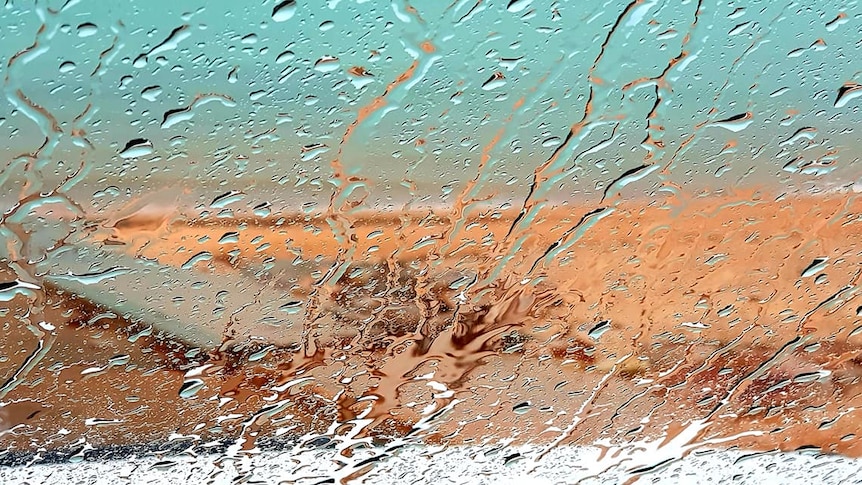 Heavy rain covers windscreen