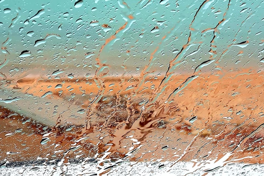 Heavy rain covers windscreen