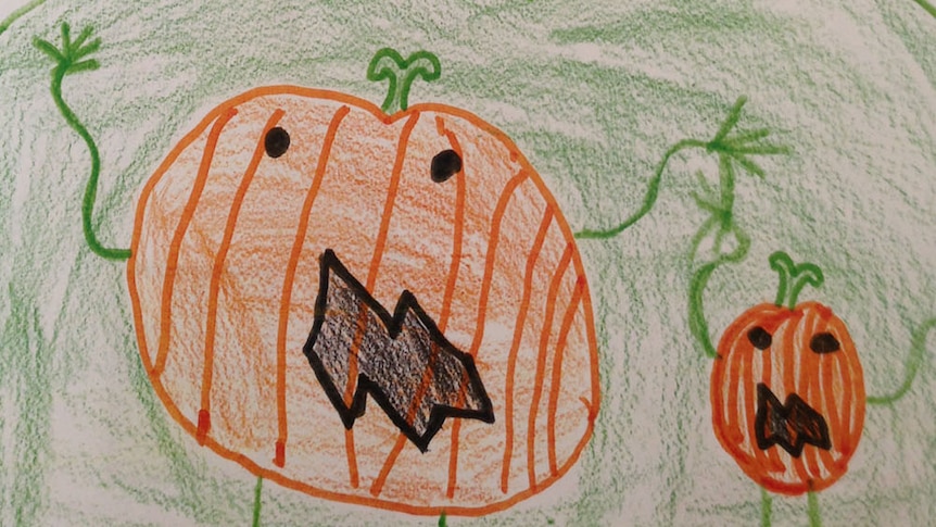 A child's pencil drawing of an evil pumpkin screaming an evil laugh.