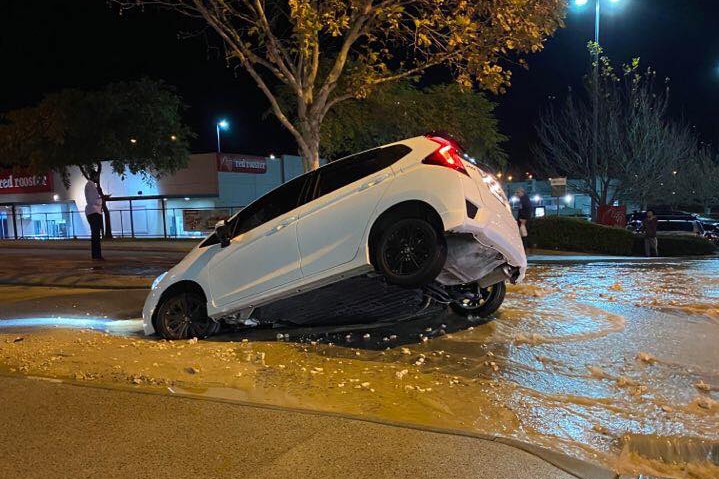 Sinkhole swallows part of car in Bennett Springs, leaving driver ...