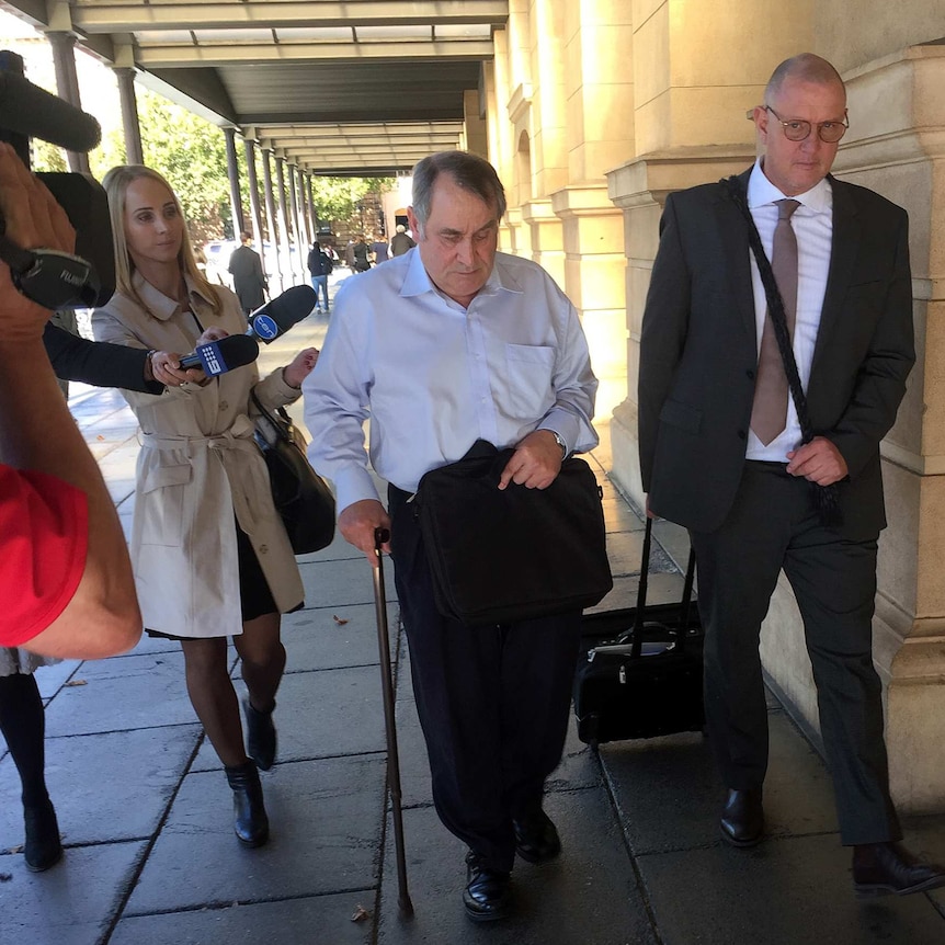 James Richard Andrew Beaumont leaves the Adelaide District Court.