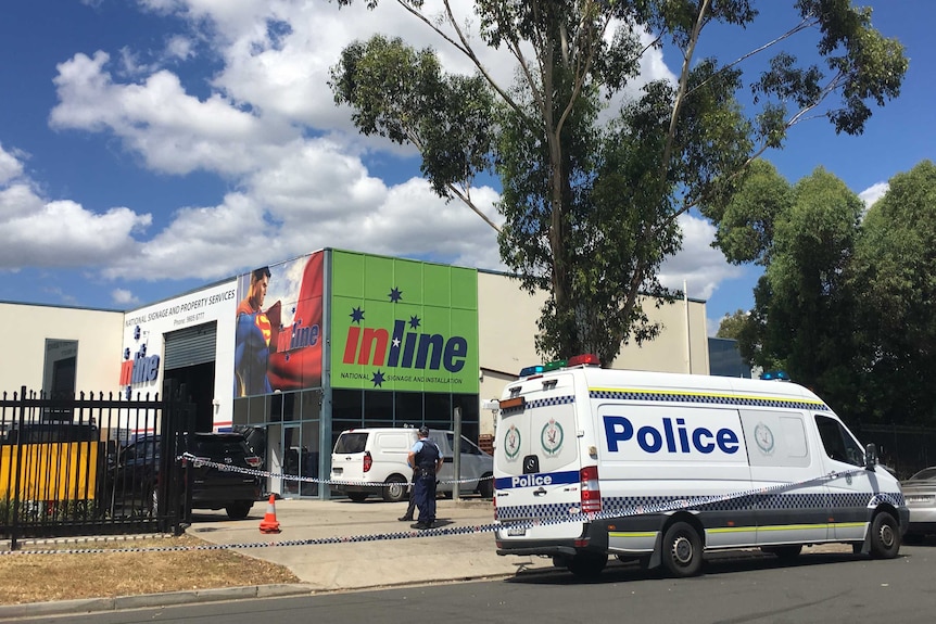 The signage company in Ingleburn which was the site of a triple shooting and siege earlier this week.