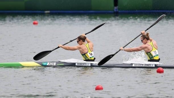 Two women paddling in a kayak