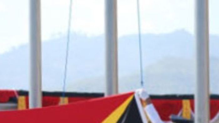 Raising East Timor's flag