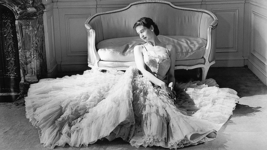 A model wears the Eugenie dress, from Christian Dior's autumn−winter 1948 haute couture collection.